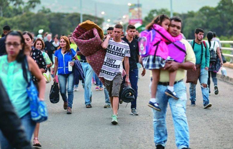 No somos peleles de nadie, protegemos a migrantes: AMLO